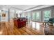 Bright and spacious living area featuring hardwood floors, neutral walls, and ample natural light at 3188 Paces Mill Se Rd, Atlanta, GA 30339