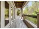 A beautiful patio perfect for outdoor relaxation with multiple doors and a grill at 3188 Paces Mill Se Rd, Atlanta, GA 30339