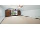 Upstairs bedroom featuring carpet and a large window with built-in bookshelves at 1061 Retner Dr, Mableton, GA 30126