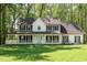 Beautiful two-story home featuring a classic design and inviting front porch at 1061 Retner Dr, Mableton, GA 30126
