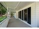 Covered front porch featuring ample space and classic architectural details at 1061 Retner Dr, Mableton, GA 30126