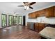 Bright kitchen with stainless steel appliances and adjacent breakfast nook overlooking the backyard at 1061 Retner Dr, Mableton, GA 30126