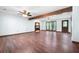 Large living room with wood floors, a fireplace, and plenty of natural light at 1061 Retner Dr, Mableton, GA 30126