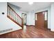Spacious living room featuring wood floors and a staircase at 1061 Retner Dr, Mableton, GA 30126