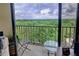 Balcony with outdoor seating offering beautiful views of the lush landscape and city skyline at 145 15Th Ne St # 1015, Atlanta, GA 30309