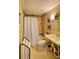 Traditional bathroom featuring a shower and tub, complemented by a pedestal sink at 145 15Th Ne St # 1015, Atlanta, GA 30309