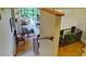 View of the living room from the staircase showing seating and balcony access at 145 15Th Ne St # 1015, Atlanta, GA 30309