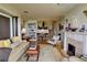 Spacious living area with fireplace, seating, bookshelf and staircase at 145 15Th Ne St # 1015, Atlanta, GA 30309