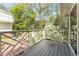 Charming balcony overlooking a landscaped backyard with lush greenery at 3038 Nancy Creek Nw Rd, Atlanta, GA 30327