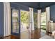 Bedroom featuring glass doors that lead to a private balcony at 3038 Nancy Creek Nw Rd, Atlanta, GA 30327