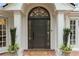 Close-up of the front door highlighting its elegant design at 3038 Nancy Creek Nw Rd, Atlanta, GA 30327