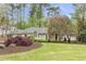 Beautiful home with landscaped front yard and charming architectural details at 3038 Nancy Creek Nw Rd, Atlanta, GA 30327