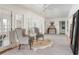 Bright living room with white trim and plush seating at 3038 Nancy Creek Nw Rd, Atlanta, GA 30327