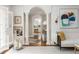 Elegant living room with decorative columns, hardwood floors, and an open floor plan at 3038 Nancy Creek Nw Rd, Atlanta, GA 30327