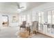 Bright sitting room with decorative chairs and natural light at 3038 Nancy Creek Nw Rd, Atlanta, GA 30327