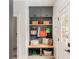 Mudroom featuring built-in cabinets, a bench, and storage shelves near the entrance at 3038 Nancy Creek Nw Rd, Atlanta, GA 30327
