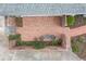 Charming brick patio with lovely plants, offering a cozy spot to relax and enjoy the outdoors at 3038 Nancy Creek Nw Rd, Atlanta, GA 30327