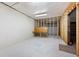 Partially finished basement featuring exposed wooden framing, concrete floor, and workbench area at 4955 Kingsbridge Ct, Powder Springs, GA 30127