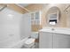 Well-maintained bathroom featuring a tub/shower combo, vanity, and ample natural light at 4955 Kingsbridge Ct, Powder Springs, GA 30127