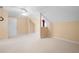 Bright bedroom featuring a large window and vaulted ceilings, perfect for relaxation at 4955 Kingsbridge Ct, Powder Springs, GA 30127