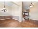 Formal dining room with hardwood floors and decorative lighting at 4955 Kingsbridge Ct, Powder Springs, GA 30127