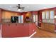 Well-equipped kitchen with granite countertops, wooden cabinets, and stainless steel appliances at 4955 Kingsbridge Ct, Powder Springs, GA 30127