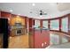 Well-equipped kitchen featuring wood cabinets and modern appliances at 4955 Kingsbridge Ct, Powder Springs, GA 30127
