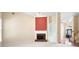Cozy living room featuring a fireplace and built-in shelving at 4955 Kingsbridge Ct, Powder Springs, GA 30127