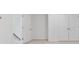 Bedroom with light carpet and two closets, providing plenty of storage space at 535 Pearl St, Cumming, GA 30040