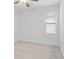 Bedroom with neutral carpet and a window with blinds at 535 Pearl St, Cumming, GA 30040