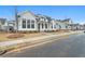 Beautiful white two-story home with manicured front yard and sidewalk in a well-kept neighborhood at 535 Pearl St, Cumming, GA 30040