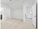 Bright loft with carpet and three door ways to different rooms at 535 Pearl St, Cumming, GA 30040