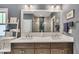 Bathroom with dual sink vanity, contemporary lighting, and linen ladder at 803 Willow Oak Dr, Woodstock, GA 30189