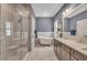 Elegant bathroom with standalone tub, a glass enclosed shower, and modern fixtures at 803 Willow Oak Dr, Woodstock, GA 30189