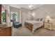 Cozy bedroom featuring a full bed, ample closet space, and soft natural lighting at 803 Willow Oak Dr, Woodstock, GA 30189