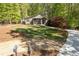 Charming home with a beautifully landscaped front yard, driveway, and mailbox, creating an inviting curb appeal at 803 Willow Oak Dr, Woodstock, GA 30189