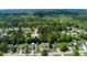 Overhead neighborhood view of numerous well-spaced homes amongst lush trees at 101 Javay Ct Ct, Villa Rica, GA 30180