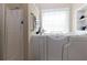 This bathroom has a walk-in tub with safety features and a shower at 101 Javay Ct Ct, Villa Rica, GA 30180