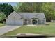 Charming one-story home featuring a well-manicured lawn and a two-car garage at 101 Javay Ct Ct, Villa Rica, GA 30180
