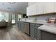 Galley kitchen featuring stainless steel appliances and modern cabinetry at 101 Javay Ct Ct, Villa Rica, GA 30180