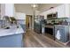 Modern kitchen featuring stainless steel appliances and white and grey cabinetry at 101 Javay Ct Ct, Villa Rica, GA 30180