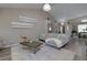 Bright living room with modern furniture, hardwood floors, and stylish decor at 101 Javay Ct Ct, Villa Rica, GA 30180