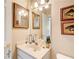 Well-lit powder room featuring elegant fixtures and tasteful decor at 1015 Heatherbrooke Ln, Atlanta, GA 30324