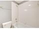 Clean bathroom with white tile shower and tub at 1015 Heatherbrooke Ln, Atlanta, GA 30324