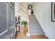 Welcoming foyer with staircase and hardwood floors, offering a grand entrance at 1015 Heatherbrooke Ln, Atlanta, GA 30324