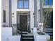 Elegant home entrance featuring classic architecture and well-maintained landscaping at 1015 Heatherbrooke Ln, Atlanta, GA 30324