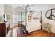Bright main bedroom features a four-poster bed, fireplace, and ample natural light at 1015 Heatherbrooke Ln, Atlanta, GA 30324