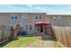 Home's backyard featuring a patio, shed and privacy fence perfect for outdoor enjoyment and relaxation at 310 Oak Leaf Pl, Acworth, GA 30102
