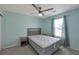 Comfortable bedroom with a queen-size bed, soft lighting, and a window with curtains, creating a relaxing atmosphere at 310 Oak Leaf Pl, Acworth, GA 30102