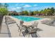 Community pool surrounded by lounge chairs at 310 Oak Leaf Pl, Acworth, GA 30102